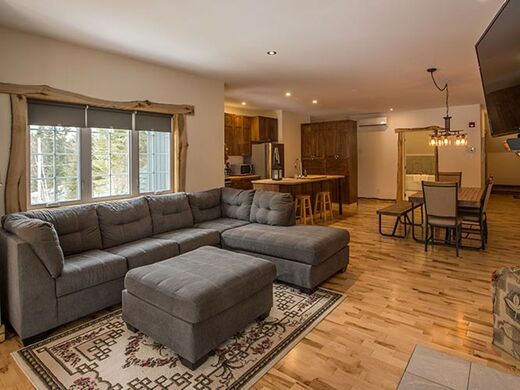 Auberge du Vieux Moulin Lanaudière Luxurious suite with living room, kitchen, wood fireplace and 2 private bedrooms